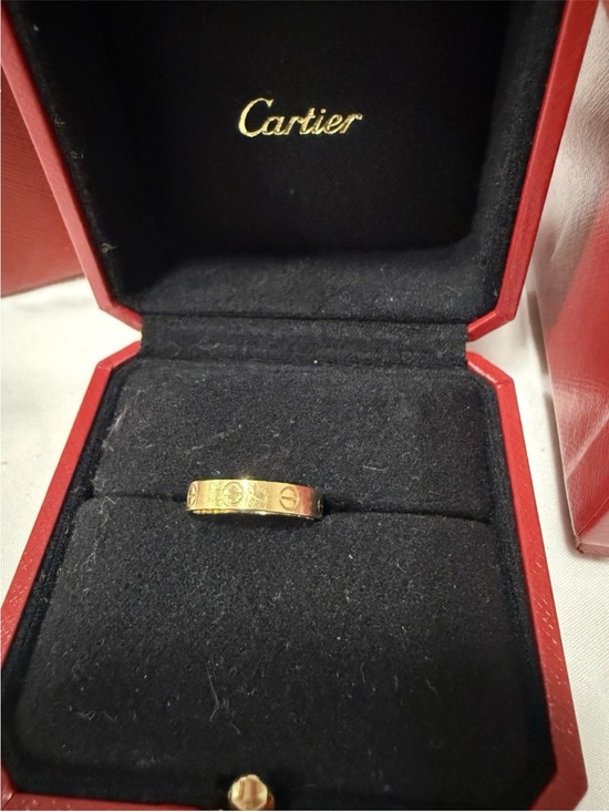 Cartier Jewelry - Cartier Gold Love Ring with Screw Motif.  Authentic